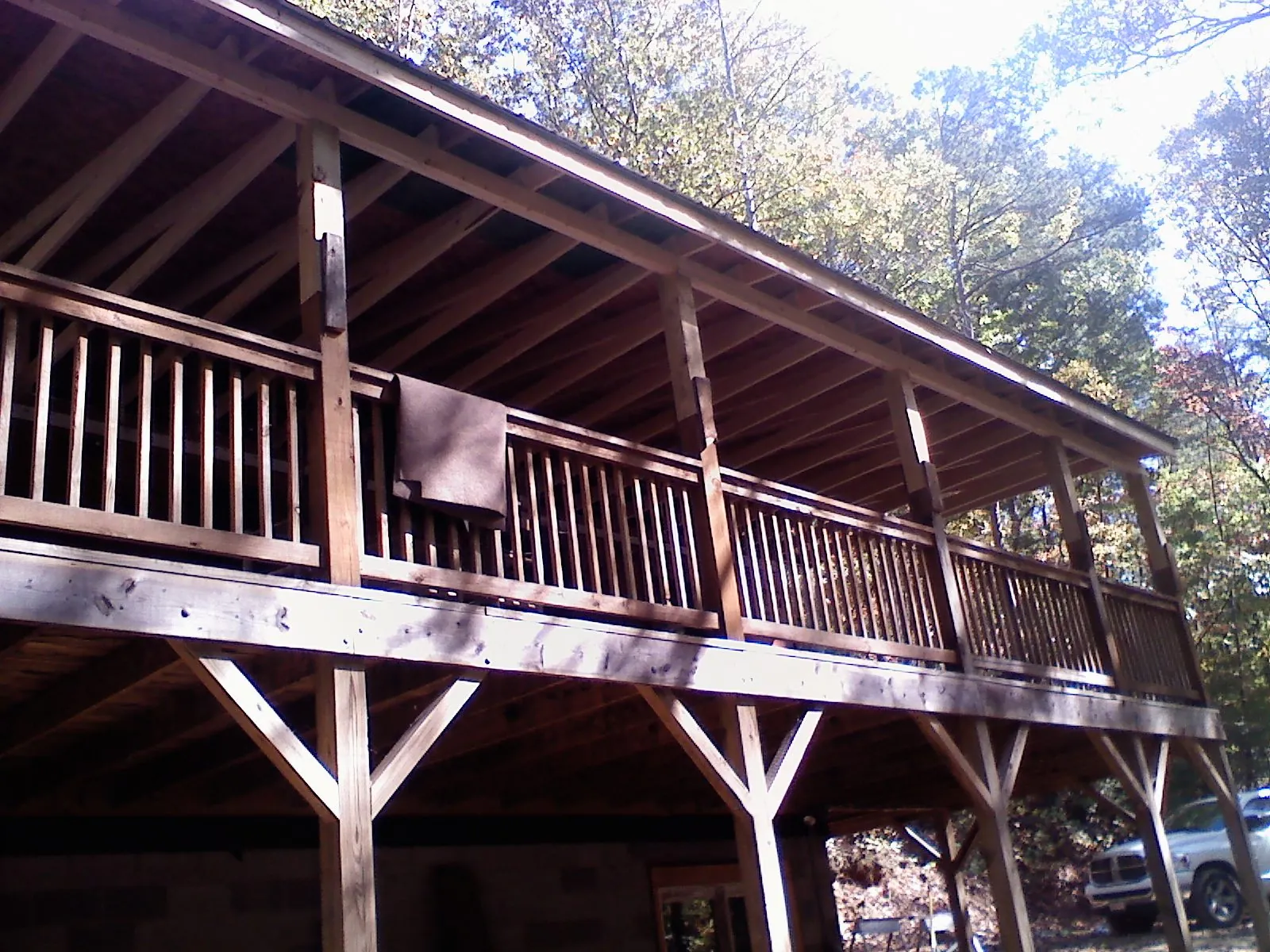 Timber framing under a new elevated porch and deck — Roof Leak Repair in Mira Loma by Roofing Brothers